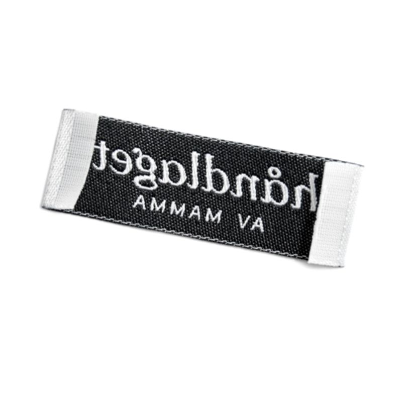 Symerke Håndlaget hvit/svart